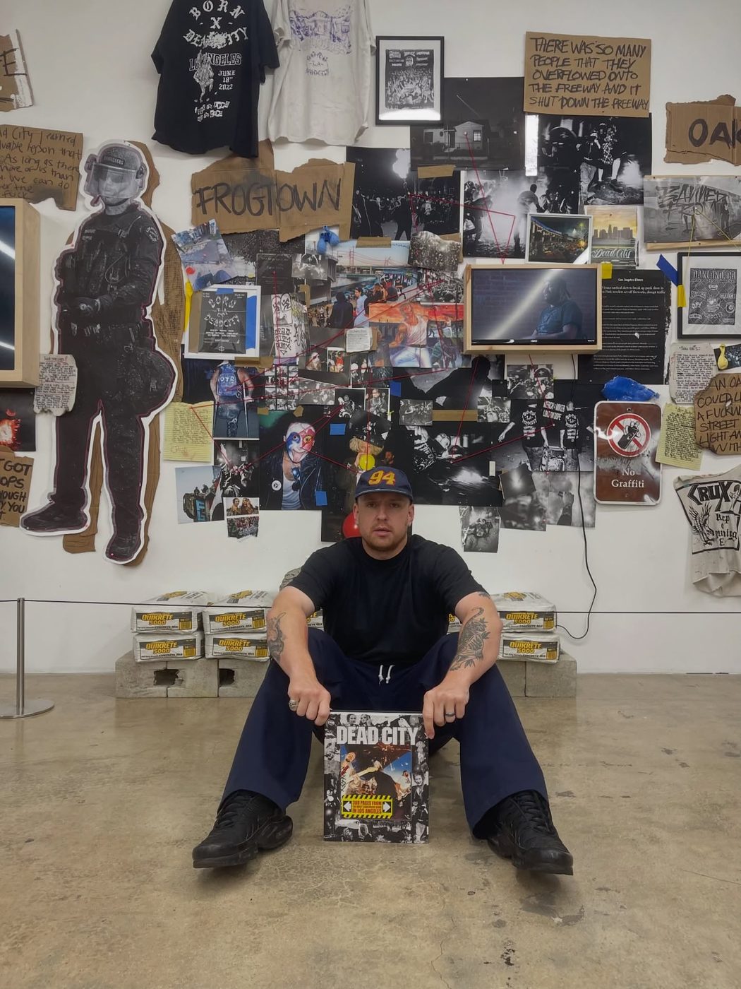 Matt Adam with the Dead City Punx book at Beyond the Streets, Los Angeles